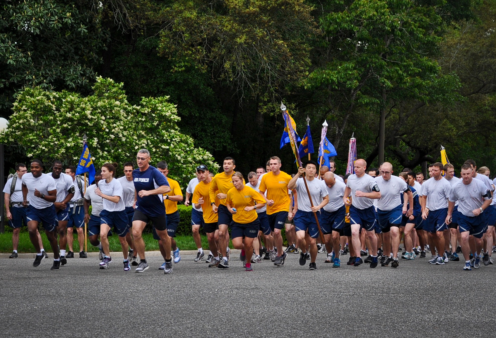 Groups from across Team Eglin take off during the inaugural 5k-run at Bob Hope Village May 1 to support residents and honor those residents who have served our nation.  The event was also a final tribute to the 33d Fighter Wing Command Chief, Chief Master Sgt. Robert Newman, who is retiring after 29 years of honorable service.  (Courtesy photo)
