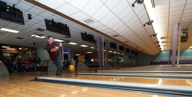 U.S. Air Force Master Sgt. Donald Benson, 7th Communications Squadron, bowls at Dyess Lanes April 30, 2013, at Dyess Air Force Base, Texas. Competing in his sixth Armed Forces Championship, Benson placed first overall Air Force-wide and finished sixth across the Department of Defense in this year’s tournament. (U.S. Air Force photo by Airman 1st Class Jonathan Stefanko/Released)