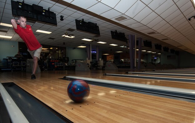 U.S. Air Force Staff Sgt. Michael Warstler, 7th Bomb Wing ground safety, bowls at Dyess Lanes April 30, 2013, at Dyess Air Force Base, Texas. Warstler placed second overall Air Force-wide and finished seventh across the Department of Defense while participating in the Armed Forces Championship. (U.S. Air Force photo by Airman 1st Class Jonathan Stefanko/Released)