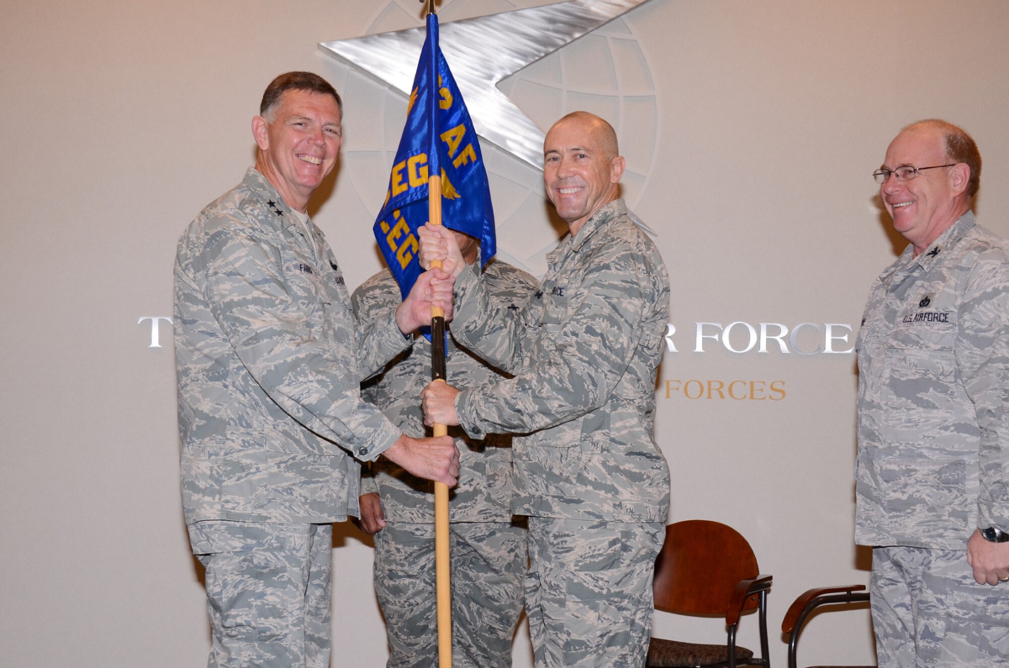 Maj. Gen. Wallace W. “Wade” Farris, Jr., 22nd Air Force commander, welcomes Col. Timothy W. Lamb, former 576th Red Horse Squadron commander, Seymour Johnson Air Force Base, to the 622d Civil Engineering Group during a Change of Command Ceremony April 7. Lamb will replace Col. Franklin L. Myers as 622d CEG commander. He will be responsible for organizing, training and equipping over 1,300 Reservists in 10 units coast to coast. (photo by Brad Fallin)