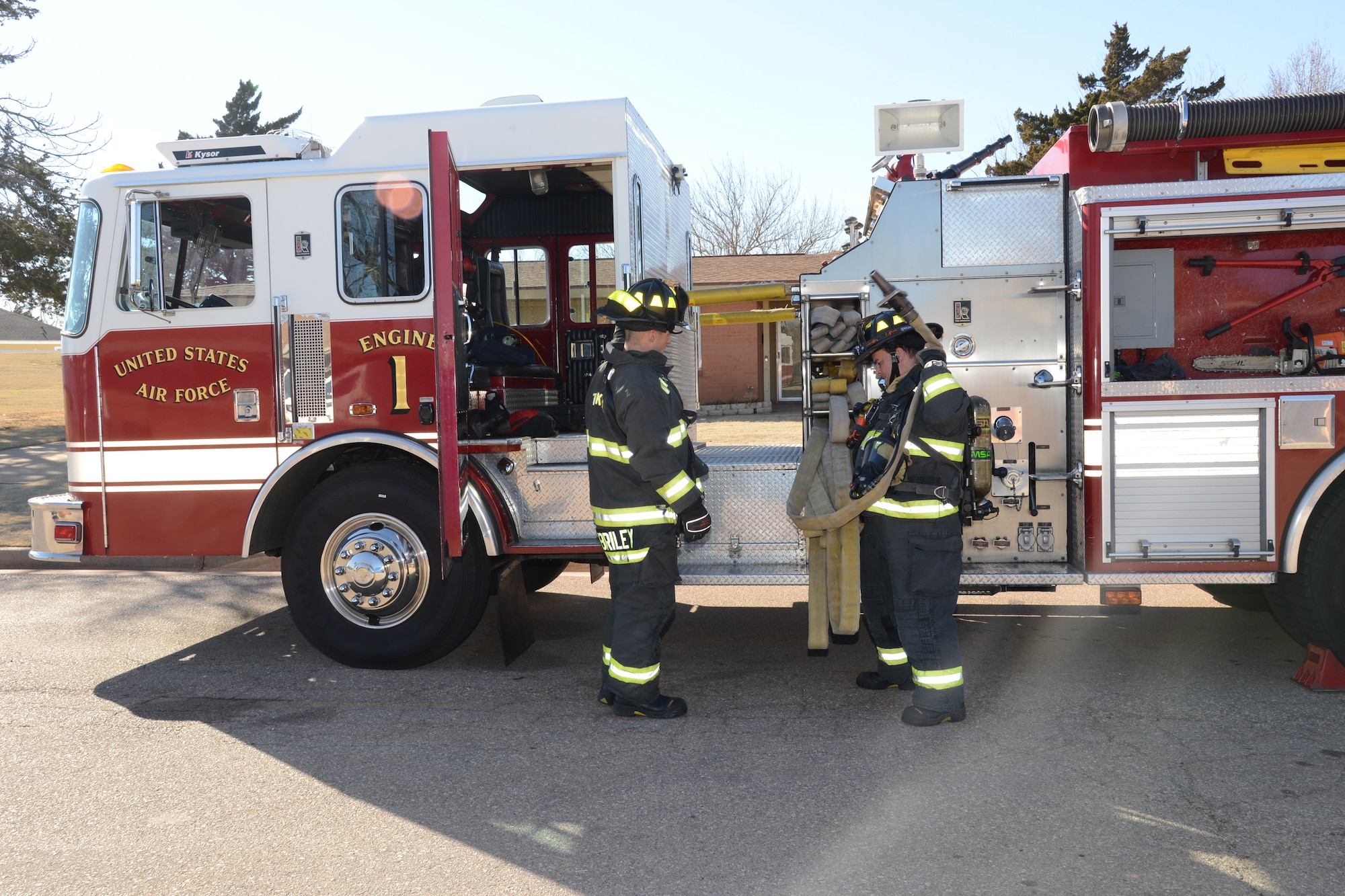 Members of Tinker’s Fire and Emergency Services Division practice fire drills at least once a week, varying the level of difficulty, the size of crews they use and the size of building in which they will be working.  (Air Force photo by Kelly White)