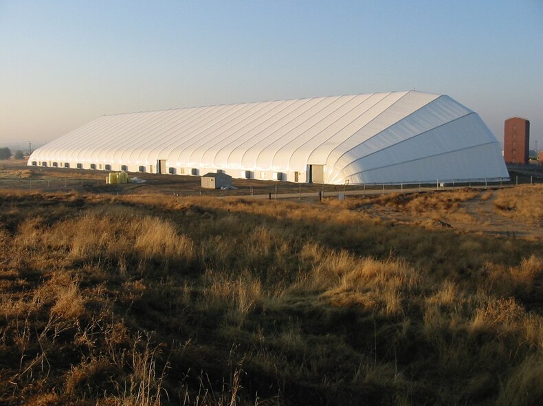 FORMER MCCLELLAN AIR FORCE BASE, Calif. – 1. Prior to demolition. After 14 years as a familiar landmark at the former McClellan Air Force Base, Calif., the “big white tent” that once covered tons of contaminated soil has come down. The tent provided shelter for cleanup crews and kept 23,409 cubic yards of contaminated soil at the site from being disturbed. After the Air Force removed the soil and crews demolished the tent in April. (U.S. Air Force photo)