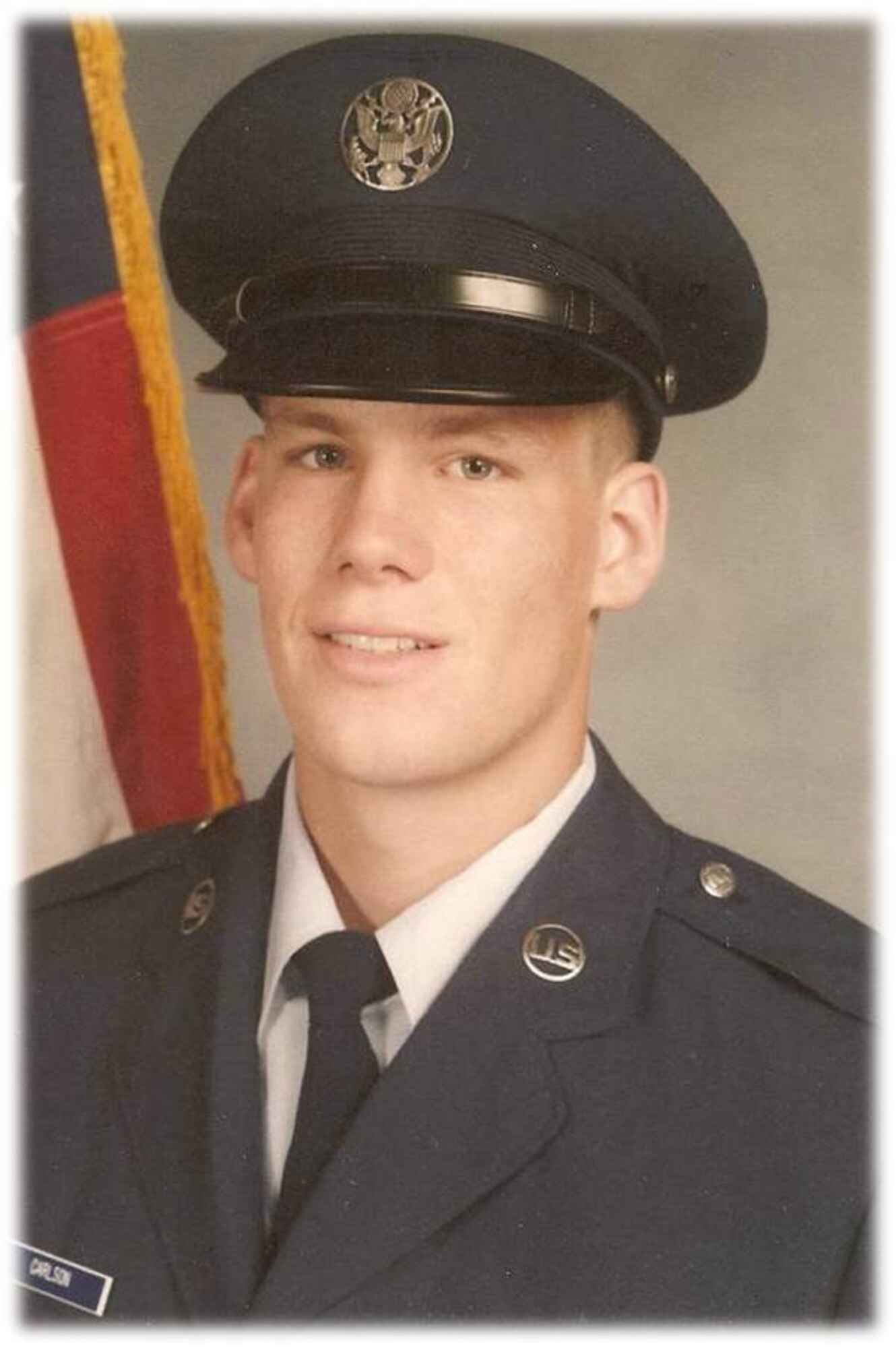 Airman Basic David Carlson, shown in his first official Air Force photo in 1983. Carlson retired as the 319th Air Base Wing’s Command Chief Master Sergeant during a ceremony May 2, 2013, on Grand Forks Air Force Base, N.D. (U.S. Air Force photo)