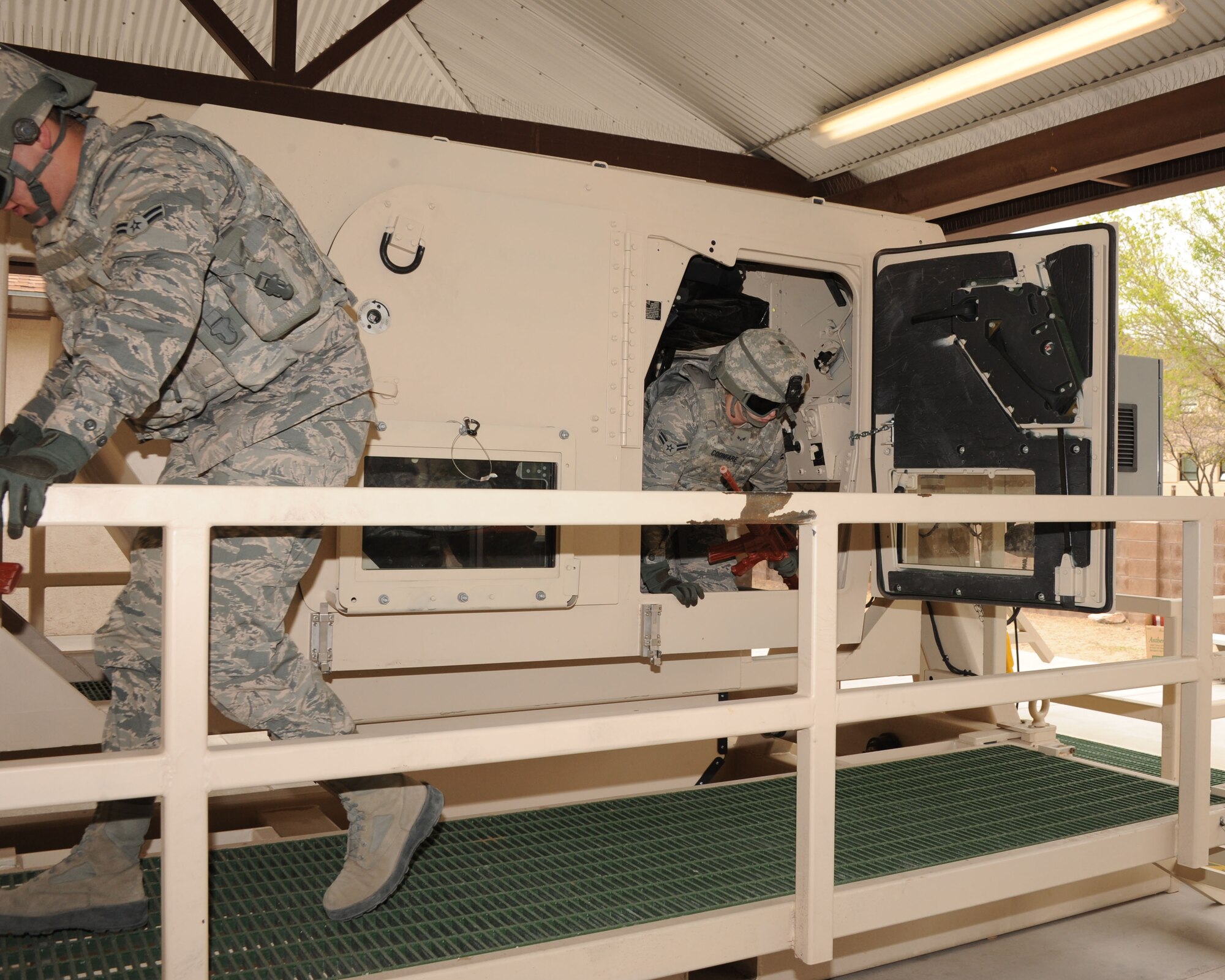 The 377th Security Forces Group’s new simulator teaches Airmen how to avoid rollover accidents and how to successfully egress from a rolled Humvee, and prepares troops for operating the vehicles in forward locations. Kirtland is the only Air Force base to have Humvee training simulator. (Photo by Dennis Carlson)