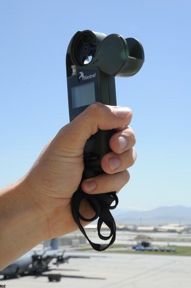Senior Airman Zachary Sura, 455th Expeditionary Operations Support Squadron weather forecaster, uses a handheld weather tracker on Bagram Airfield, Afghanistan, May 1, 2013. The handheld tracker measures temperature, dew point and other meteorological data in the event the main weather radar system is unavailable. (U.S. Staff Sgt. David Dobrydney)