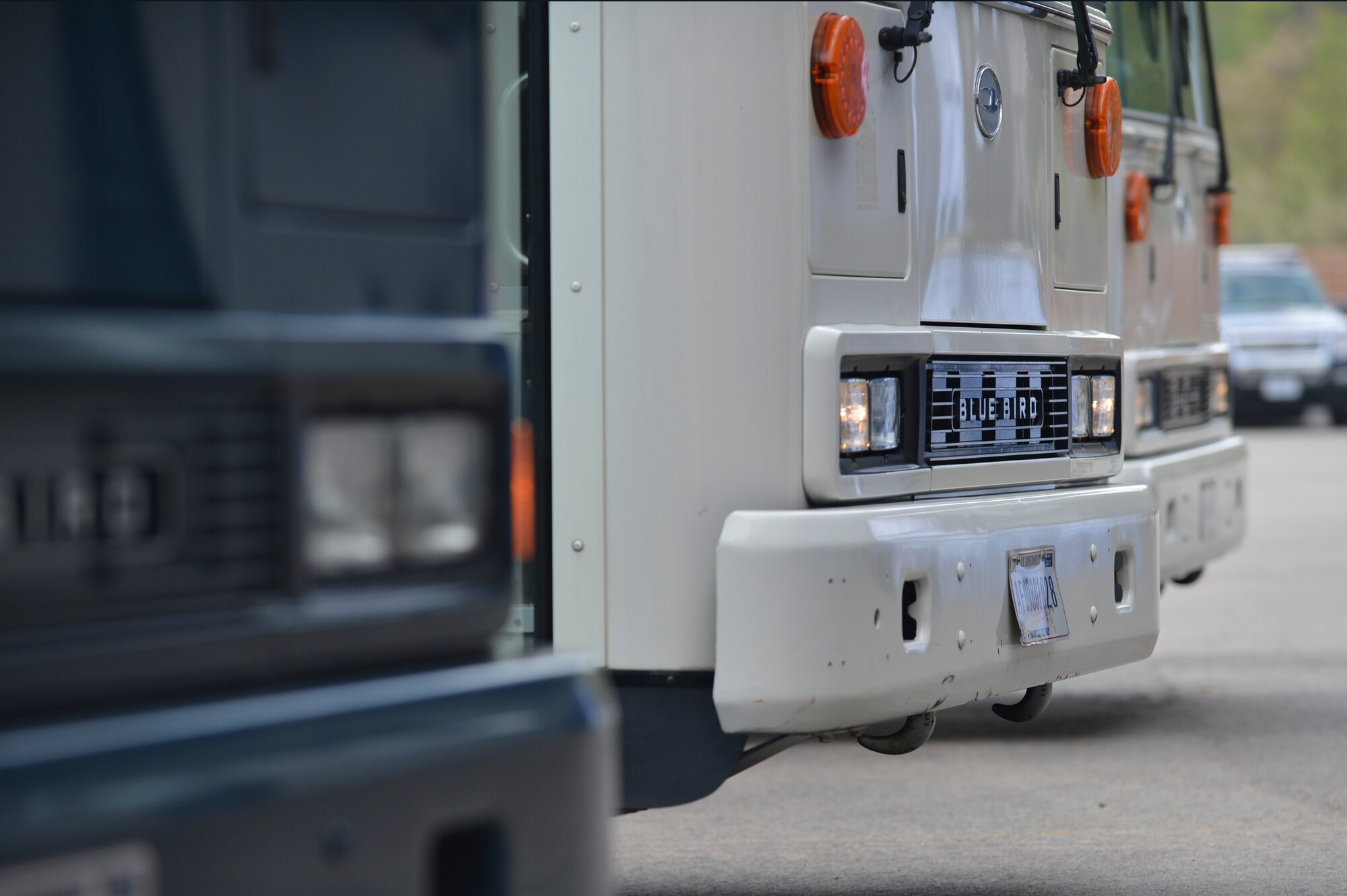 Busses wait for “evacuees” during a readiness inspection on Ramstein Air Base, Germany, May 2, 2013. The purpose of this readiness inspection was to test Ramstein’s Airmen ability to safely evacuate and receive noncombatants from a hostile environment.  (U.S. Air Force photo/Airman 1st Class Jordan Castelan)