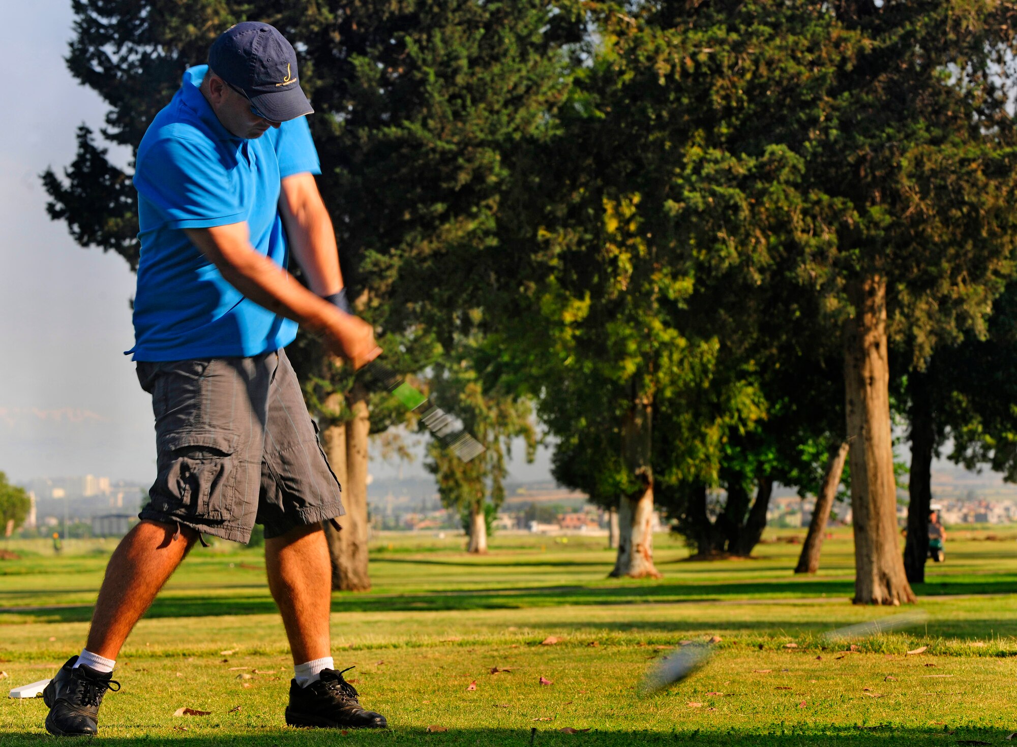 Master Sgt. Bill Barry, 39th Logistics Readiness Squadron first sergeant, strikes a golf ball during the second annual Air Force Assistance Fund Golf Outing May 3, 2013, at Incirlik Air Base, Turkey. The event was a four-person scramble where teams use the best played ball for the team rather than individual scores. (U.S. Air Force photo by Senior Airman Anthony Sanchelli/Released)