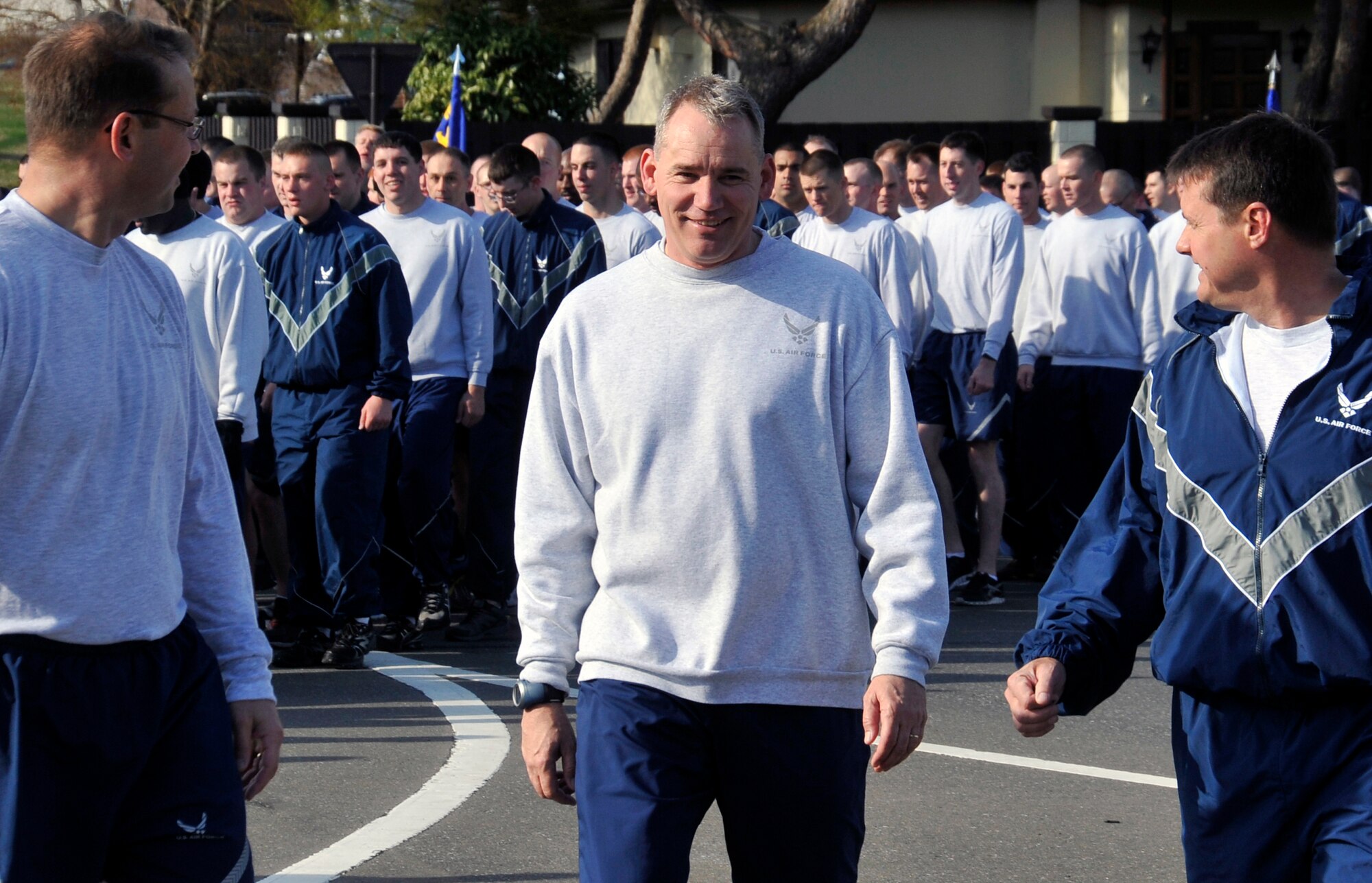 U.S. Air Force Col. Stephen Williams, left, 35th Fighter Wing commander, and Col. Matthew Dana, right, 35 FW vice commander, look back at Chief Master Sgt. James Laurent, 35 FW command chief, after a warrior run at Misawa Air Base, Japan, May 3, 2013. For Misawa, this was the first warrior run of the year but the last for Laurent. (U.S. Air Force photo by Airman 1st Class Zachary Kee)