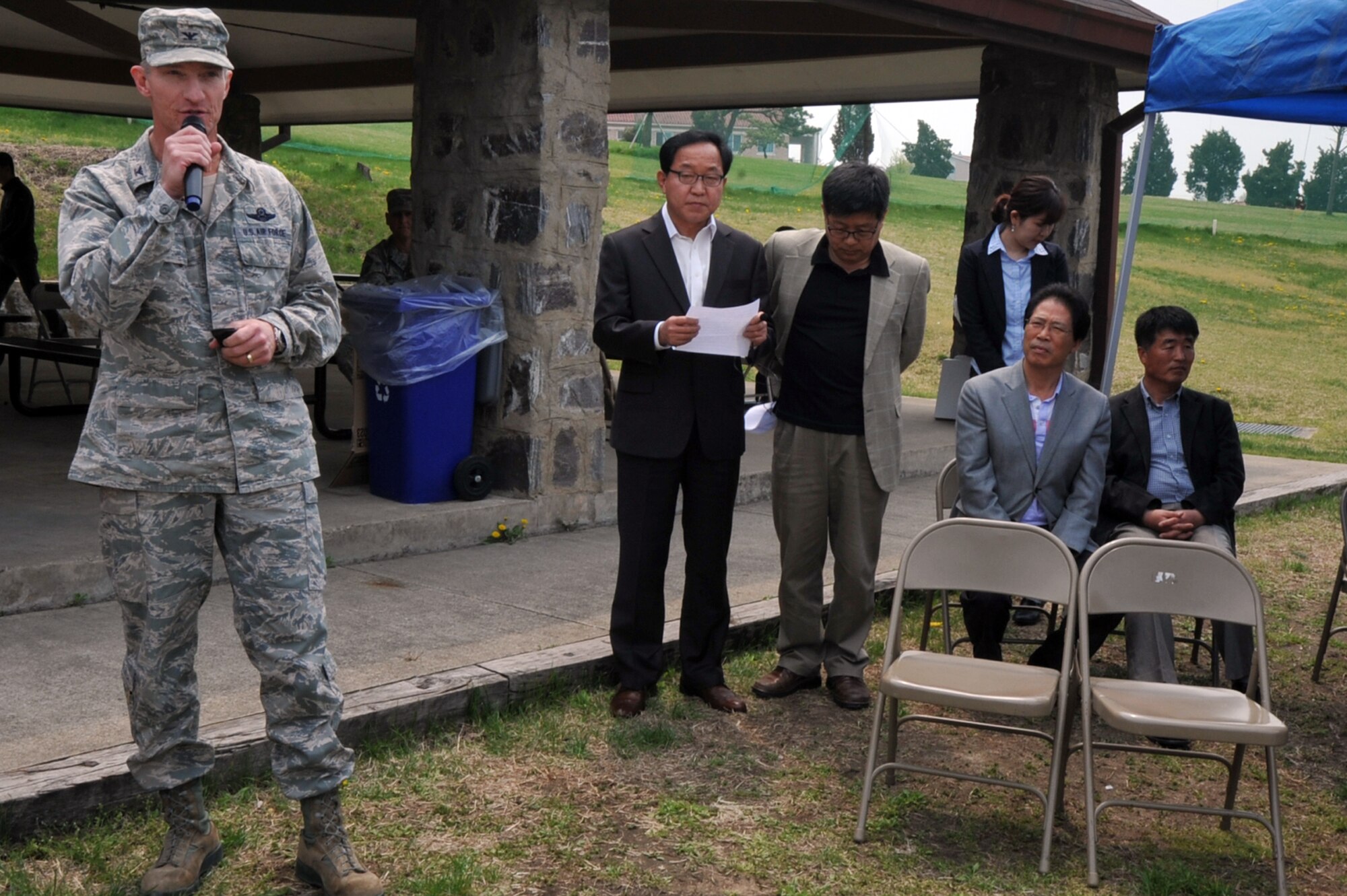 Col. Patrick McKenzie, 51st Fighter Wing commander, speaks at the 2013 Korean Union Labor Day cookout at Osan Air Base, Republic of Korea, May 3, 2013. The commander stressed the union employees’ importance to the base’s every-day mission. (U.S. Air Force photo/Senior Airman Alexis Siekert)