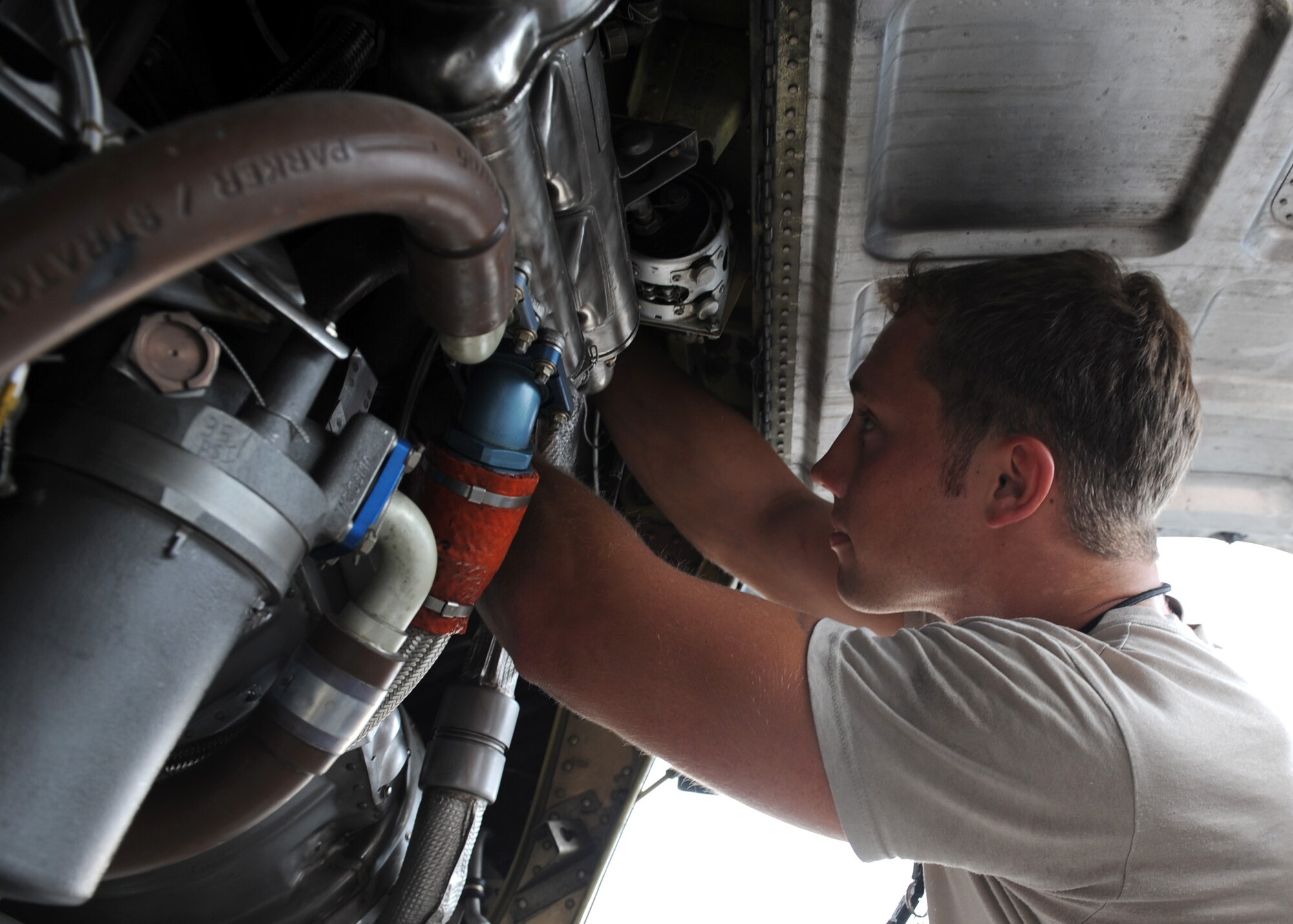 SOUTHWEST ASIA – Senior Airman Danny Carlson, 746th Expeditionary Aircraft Maintenance Unit, goes over engine checks, May 1. The engine shop looks over each of the C-130’s engines every three days to ensure they maintain peak performance. Carlson is deployed from Pope Air Field, N.C. (U.S. Air Force photo/Staff Sgt. Joel Mease)