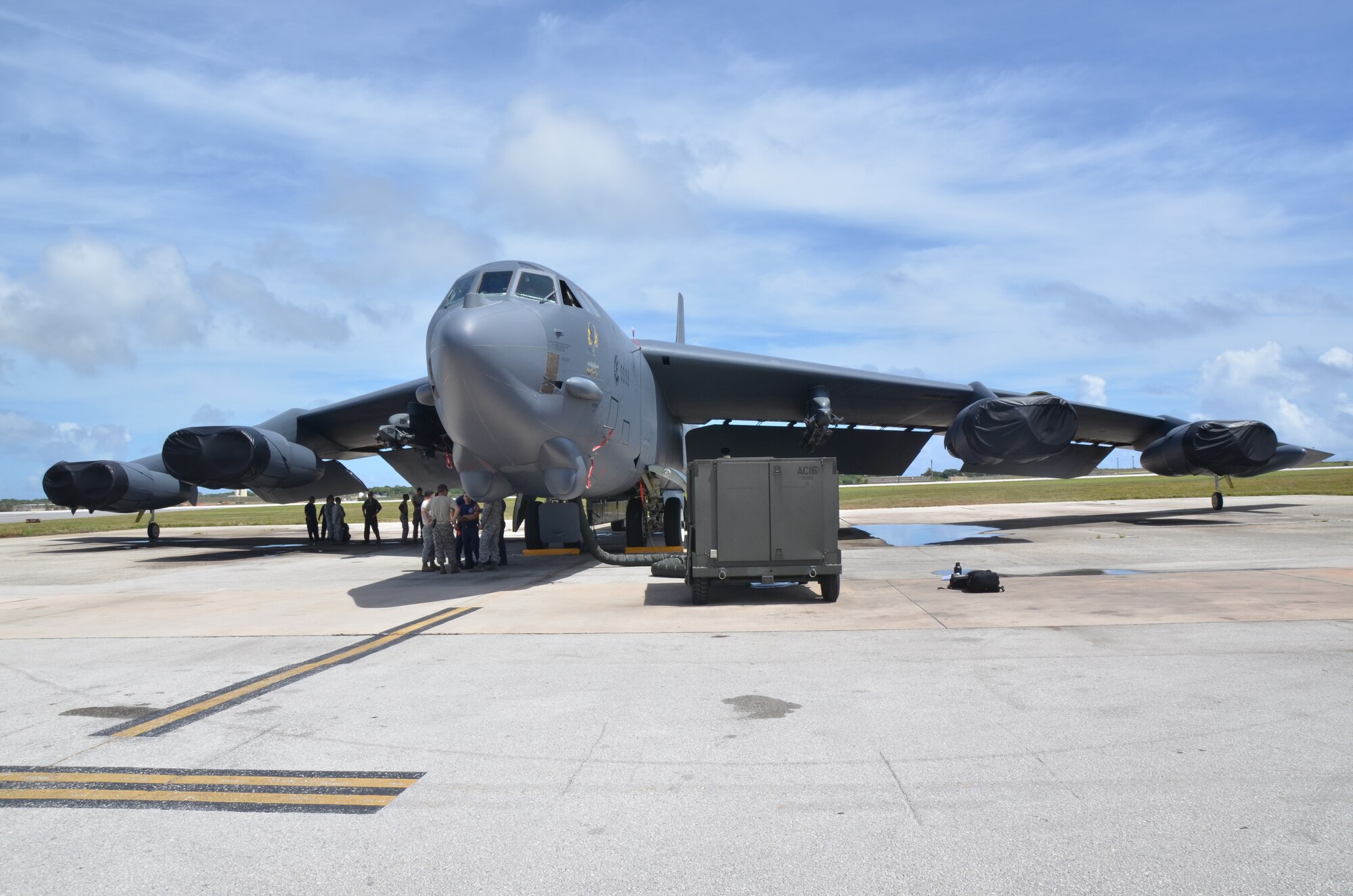 Members from the 36th Civil Engineer Squadron Andersen Fire and Emergency Services and the 23rd Expeditionary Bomb Squadron tour the B-52 Stratofortress during safety training on Andersen Air Force Base, Guam, April 30, 2013. The training covered various safety mishaps associated with the B-52 and allowed members from the 23rd EBS and the 36th CES to discuss issues regarding aircraft safety. (U.S. Air Force photo by Staff Sgt. Veronica McMahon/Released)