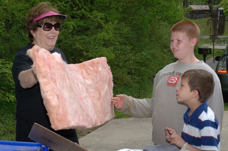 Penny Brooks with the Sierra Club Middle Tennessee Group, asks these West Cheatham Elementary School students what is used to make fiber glass.  They were participating in Environmental Awareness Day May 3, 2013 at Cheatham Lake in Ashland City, Tenn. The U.S. Army Corps of Engineers organized and sponsored the event.