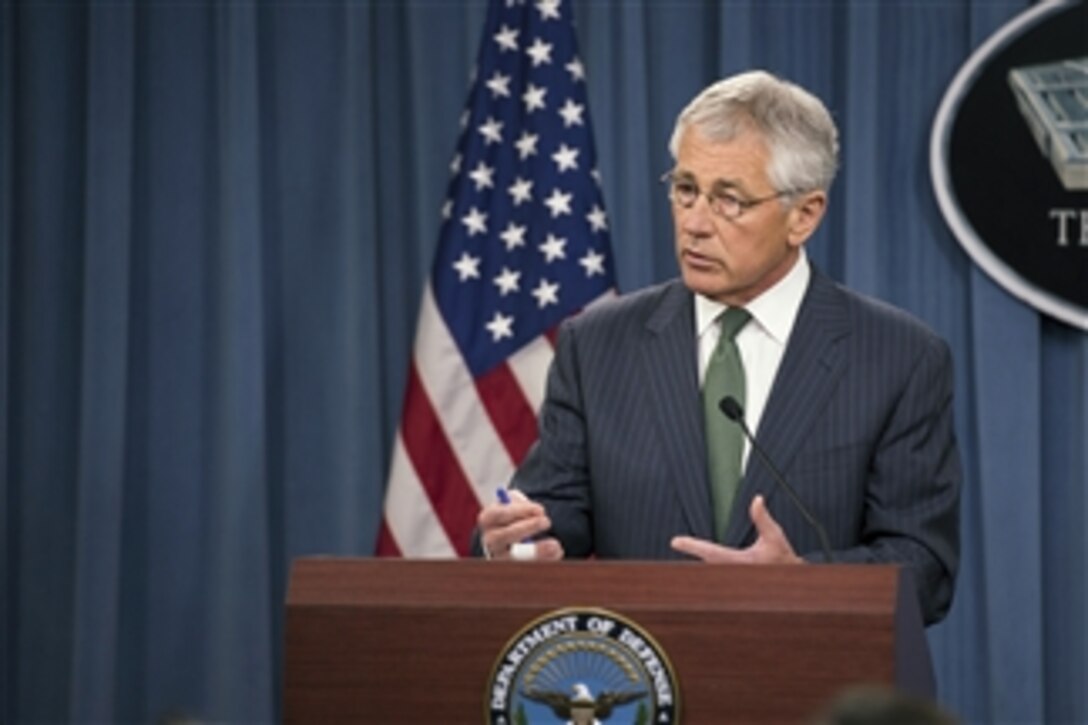 Secretary of Defense Chuck Hagel answers a reporter’s question during a joint press conference with the United Kingdom's Secretary of State for Defence Phillip Hammond in the Pentagon on May 2, 2013.  Hagel and Hammond told reporters about their earlier meeting where they discussed the situations in Syria, Iran and Afghanistan and then took questions.  