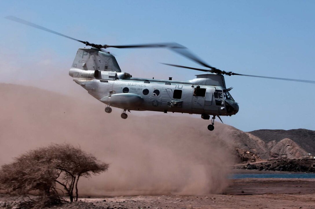 A CH-46 Sea Knight helicopter with HMM 364 (Rein.), 15th Marine Expeditionary Unit, prepares to land at Arta Beach, Djibouti, Feb. 11. The helicopter was conducting exercises as part of sustainment training during the MEU’s Western Pacific Deployment 12-02. The 15th MEU is deployed as part of the USS Peleliu Group, and is scheduled to complete its eight-month deployment and return to Marine Corps Air Station Camp Pendleton Sept. 13. (U.S. Marine Corps photo by Cpl. John Robbart III/Released)