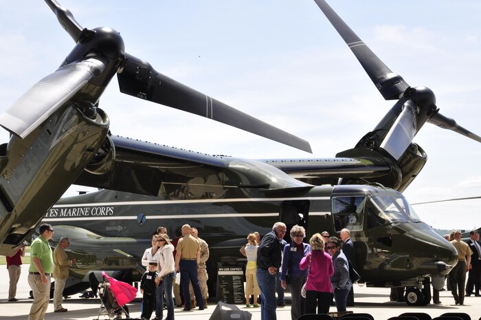 Marine Helicopter Squadron One Marines, past and present, family members and friends mingle on the flight line with the newest addition to the squadron, a MV-22 B ‘Osprey,’ after a MV-22B Introduction Ceremony in the HMX-1 hangar on May 4, 2013. HMX-1 is scheduled to receive 11 more MV-22B by next summer. 