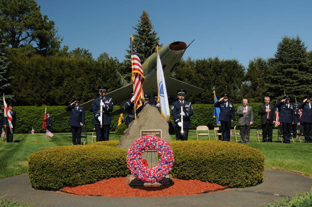 Members of the 104th Fighter Wing, Barnes Air National Guard Base, Westfield, Mass. and distinguished guests gather May 4, 2013 to honor fallen guardsmen at the annual F-100 re-dedication memorial ceremony.  The F-100 memorial, originally dedicated by the 104th Fighter Wing’s Chief Council in 1987, honors the 12 fallen guardsmen who have given the ultimate sacrifice in the line of duty.  During the ceremony, 104th Fighter Wing Commander, Col. James Keefe said, “Every day we drive past this monument, which serves as a reminder that the defense of our nation can come with a price, and that many have fallen to preserve the freedoms we enjoy.  This unit has a proud history of service, and today, we embody that legacy.”
(U.S. Air National Guard photo by Tech. Sgt. Melanie J. Casineau/released)