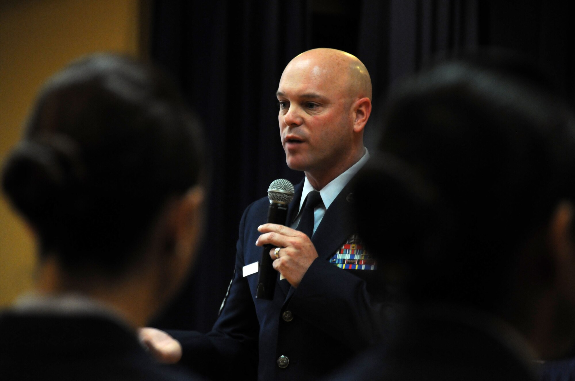 Newly promoted Staff Sergeants and Master Sergeants from the 944th Fighter Wing were inducted into the NCO and SNCO Corps at an induction ceremony held May 05 at Luke Air Force Base, Ariz.
Chief Master Sgt. David Staton, Command Chief Master Sergeant, 56th Fighter Wing, Luke Air Force Base, was the guest speaker.  Chief Staton spoke to over 40 inductees about the importance of their milestone promotions.  
“It’s not about school, endorsement or praise; it’s about doing your job”, said Chief Staton.  He also spoke about the importance of the NCO’s role to young Airmen.  “NCOs are the first line of defense for our Airmen.  Take care of their needs and desires.  You didn’t reach the rank you are at by osmosis, somebody had to teach you.  Your Airmen want both attention and discipline.”  (U.S. Air Force photo/Staff Sgt. Josh Nason) 