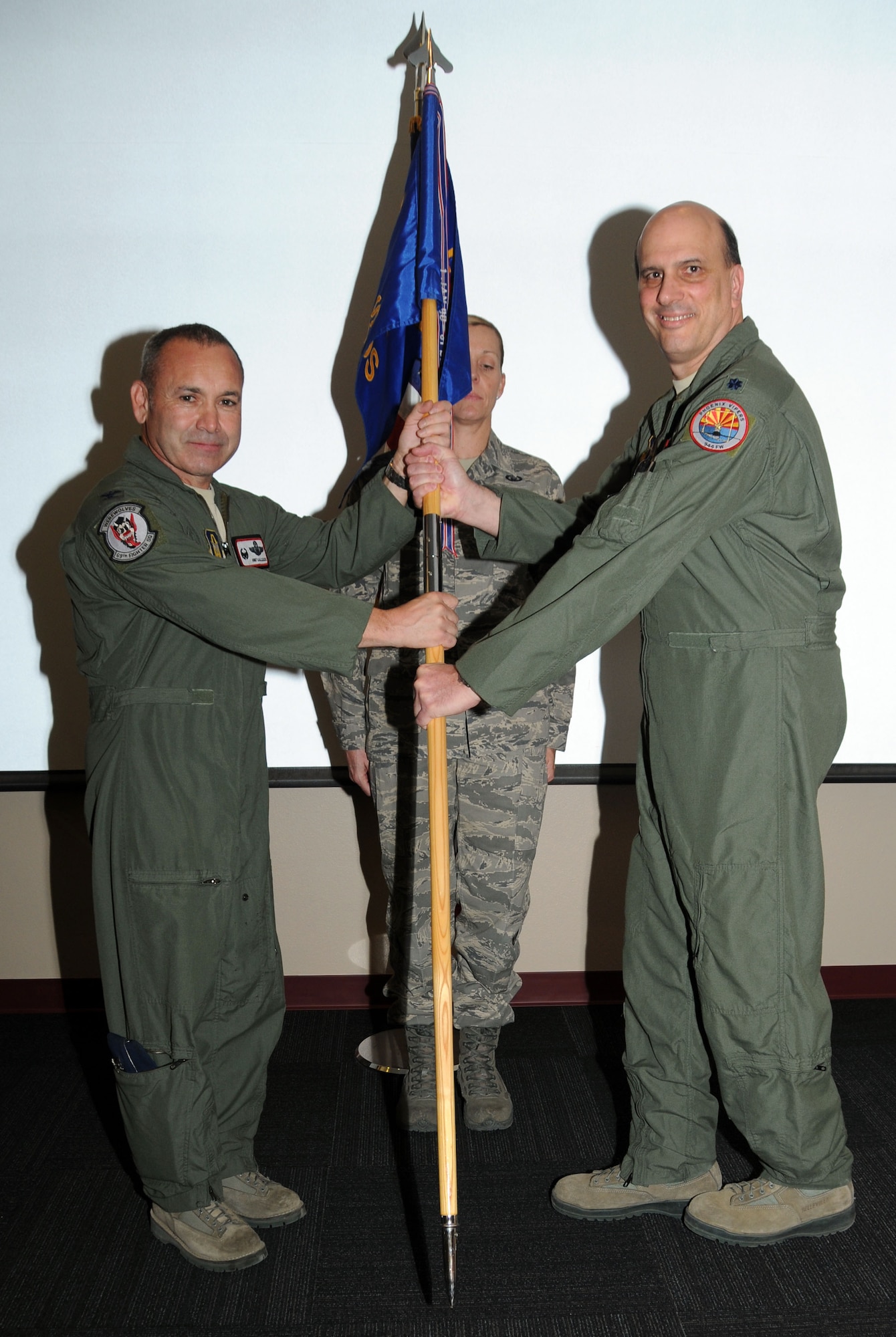 Lt Col. Alfred C. Rossum succeeded Col. Judith P. Patton as the new commander of the 944th Medical Squadron, here May 5 during an assumption of command ceremony. (U.S. Air Force photo/Staff Sgt. Josh Nason) 