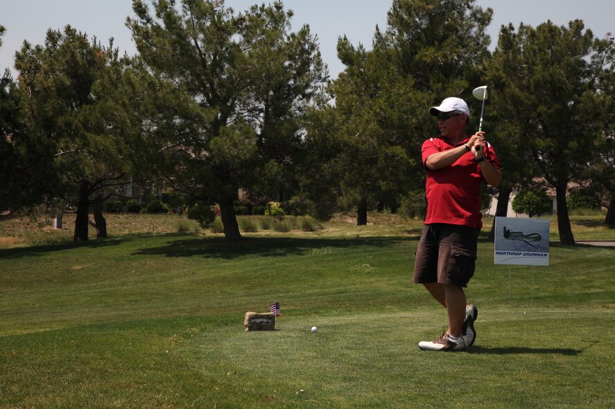 The 13th Reconnaissance Squadron, 940th Wing hosted a golf tournament at the Lincoln Hills Golf Course in Lincoln, CA May 3 to raise funds for the 13 RS booster club. The golf tournament attracted hundreds of participants from the local area. (U.S. Air Force Photo/ TSgt Kenny McCann)