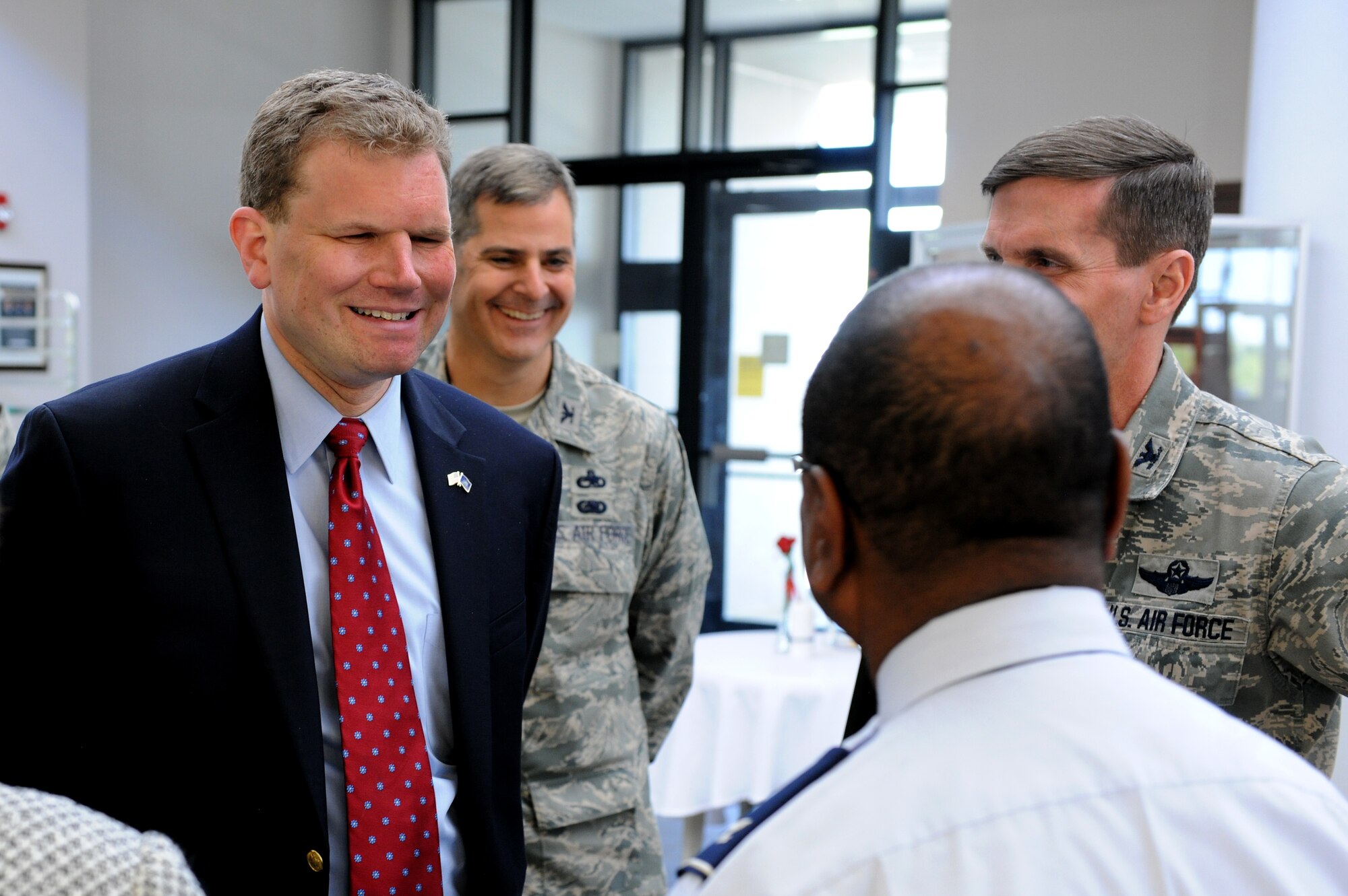 U.S. Rep. Dan Maffei (NY-24) talks with retiring Col. Wenzell Carter during the congressman's visit to Hancock Field Air National Guard Base on Saturday May 4, 2013.  Rep. Maffei spent time at the dining facility eating with members of the 174th Attack Wing. (New York Air National Guard photo by Tech. Sgt. Justin A. Huett/Released)