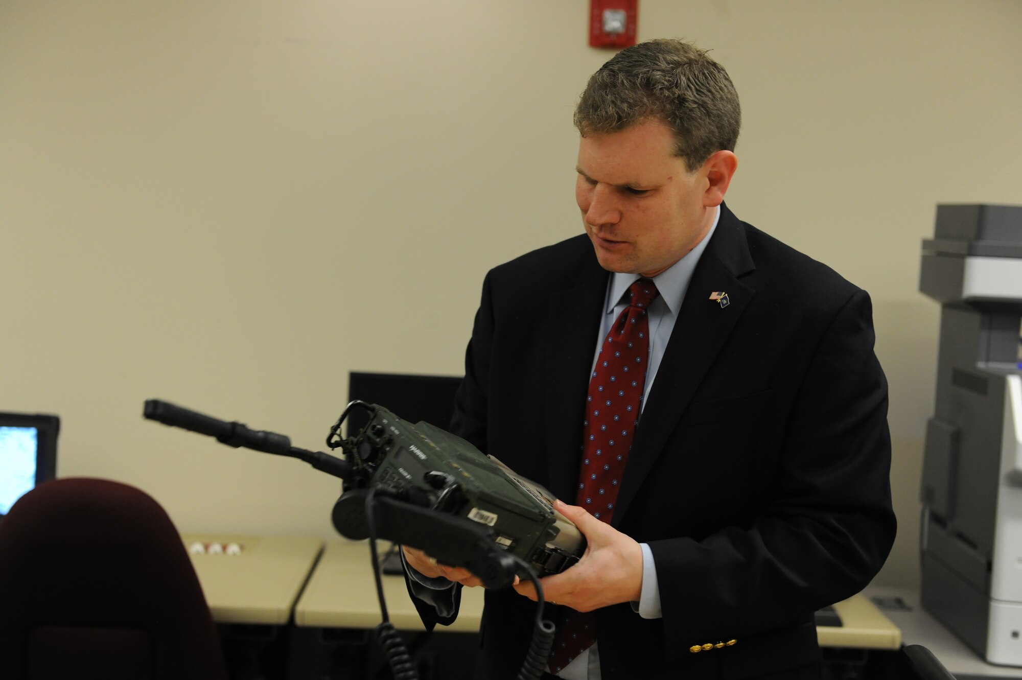 U.S. Representative Dan Maffei (NY-24) holds a tactical communications radio from the 274th Air Support Operations Squadron during a vist to Hancock Field Air National Guard Base, Syracuse New York on Saturday May 4, 2013. (New York Air National Guard photo by Tech. Sgt. Justin A. Huett/Released)