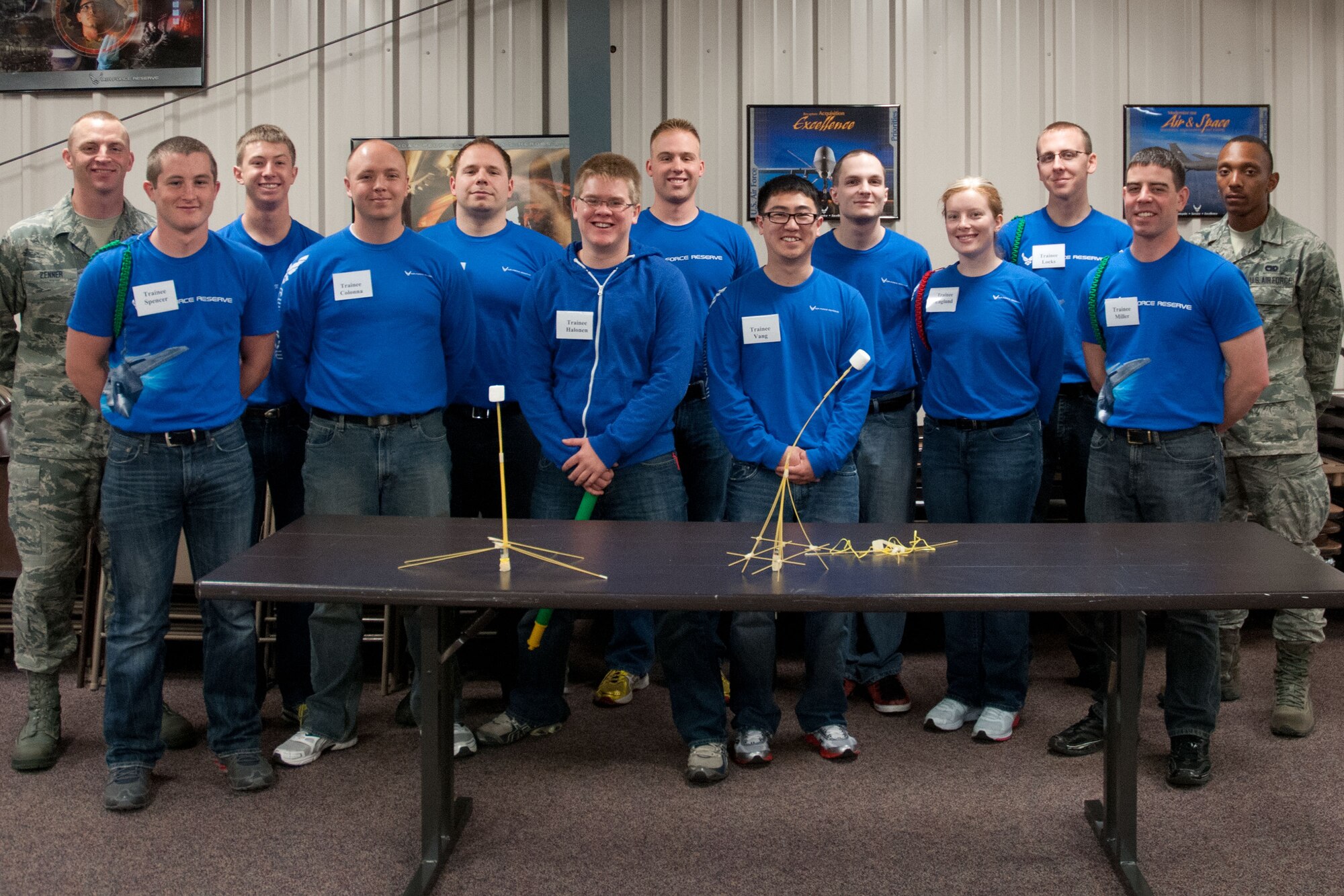 Members from the 934th Airlift Wing Development Training Flight, Tech. Sgt. Ricky Zenner, Noncommissioned Officer in Charge, trainees Derek Spencer, Justin Hruby, Joshua Colonna, Chris Gustafson, Tyler Halonen, Nathan Krogstad, Larlee Vang, Kyle Muecke, Keirsten Englund, Tony Loeks, Blaine Miller and Airman Trent Ervin, 934th Logistics Readiness Squadron, competed in a marshmallow challenge on May 5, at the Minneapolis-St. Paul Air Reserve Station, Minn. The challenge was to build the tallest free standing structure strong enough to hold a marshmallow and tested trainees on problem solving, making assumptions, and teamwork. (US Air Force Photo/Staff Sgt. Samantha Wagner)