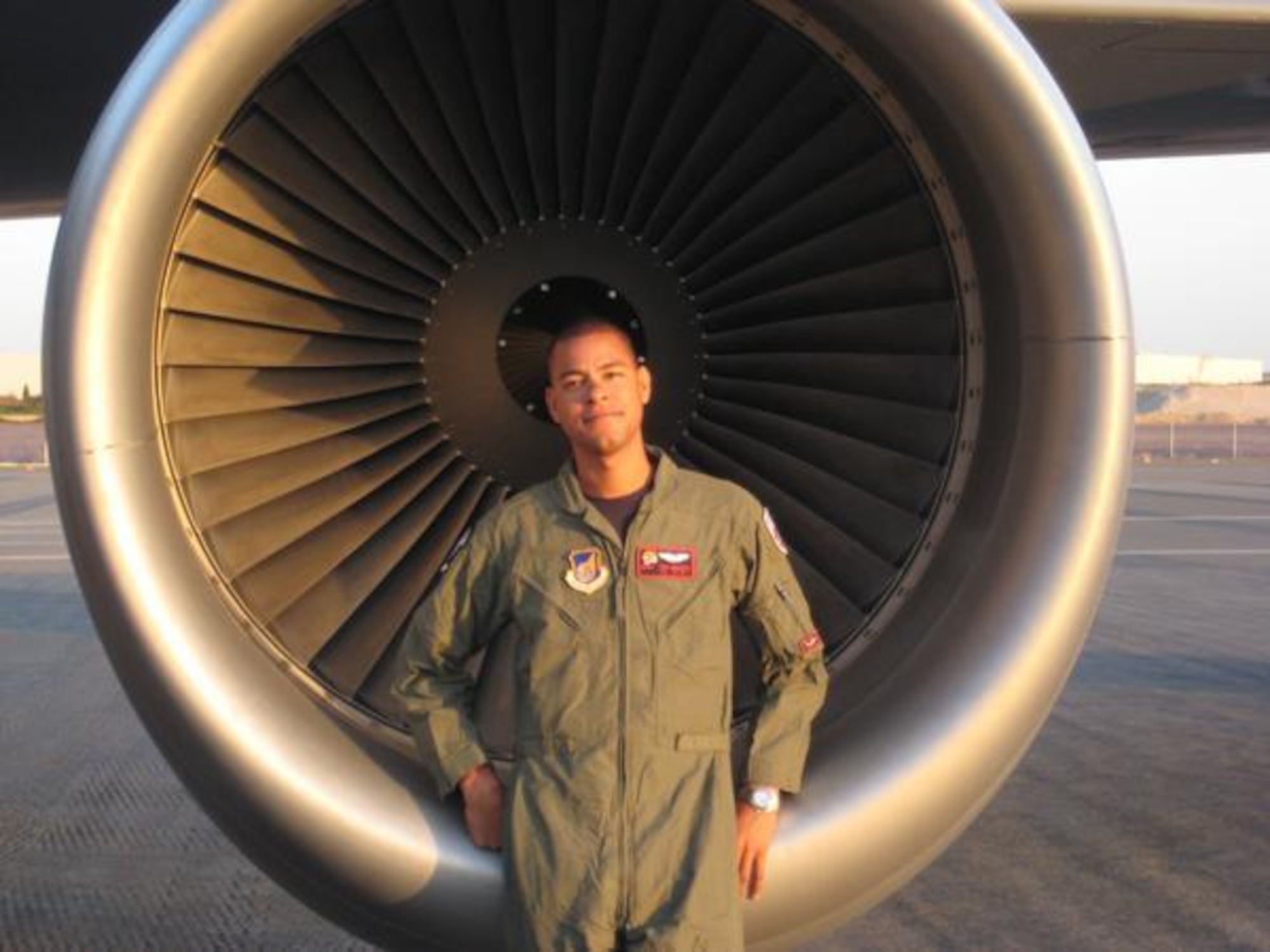 Technical Sergeant Herman "Tre" Mackey III, 30, from Bakersfield, California, sits in front of a KC-135 engine. Sgt. Mackey died on 3 May 2013 when his aircraft crashed shortly after takeoff near Bishkek, Kyrgyzstan. (Courtesy photo)