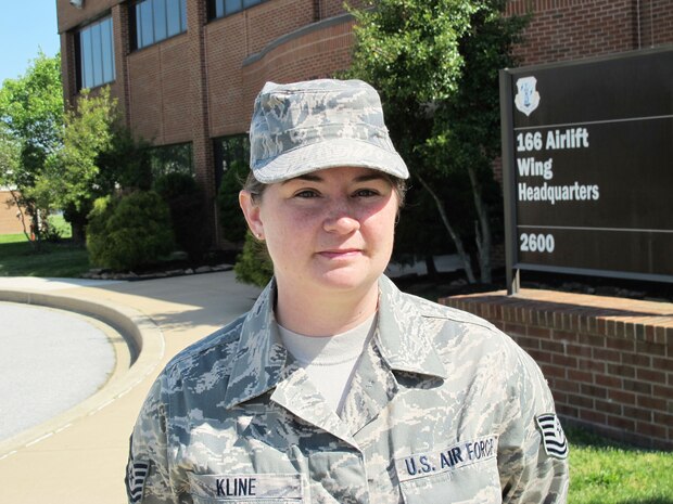 Technical Sgt. Amy Kline, a single mother, resident of Newark, Del., contracting officer and 15-year member of the 166th Airlift Wing, Delaware Air National Guard, at the New Castle ANG Base on May 3, 2013 before she leaves the week of May 6 for two weeks of Combat Airman Skills Training at Joint Base McGuire-Dix-Lakehurst, N.J., followed by a six month deployment to the Joint Theater Support Contracting Command near Kabul, Afghanistan. Kline will work under U.S. Central Command authority as a contingency contracting officer with specialists who manage contracts for supplies and services used throughout U.S. CENTCOM’s area of responsibility covering 20 countries. (U.S. Air National Guard photo by Tech. Sgt. Benjamin Matwey)