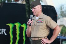 Col Scott Loch, Commanding Officer of Marine Corps Activity Guam speaks during the John Gerber Memorial 5 k run, commemorating health and the physical fitness of the island.
