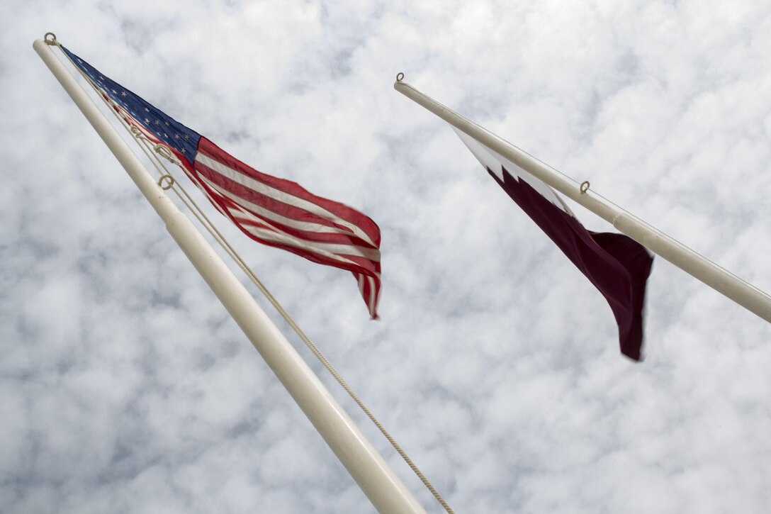 The U.S and Qatari flags are displayed at the final Eagle Resolve exercise in Al Galail, Qatar, May 2, 2013. Eagle Resolve is an annual multilateral exercise designed to enhance regional cooperative defense efforts in the Gulf Cooperation Council nations and U.S. Central Command. The 26th Marine Expeditionary Unit is deployed to the 5th Fleet area of operations as part of the Kearsarge Amphibious Ready Group. The 26th MEU operates continuously across the globe, providing the president and unified combatant commanders with a forward-deployed, sea-based quick reaction force. (U.S. Marine Corps photograph by Gunnery Sgt. Michael Kropiewnicki, 26th MEU Combat Camera/Released)