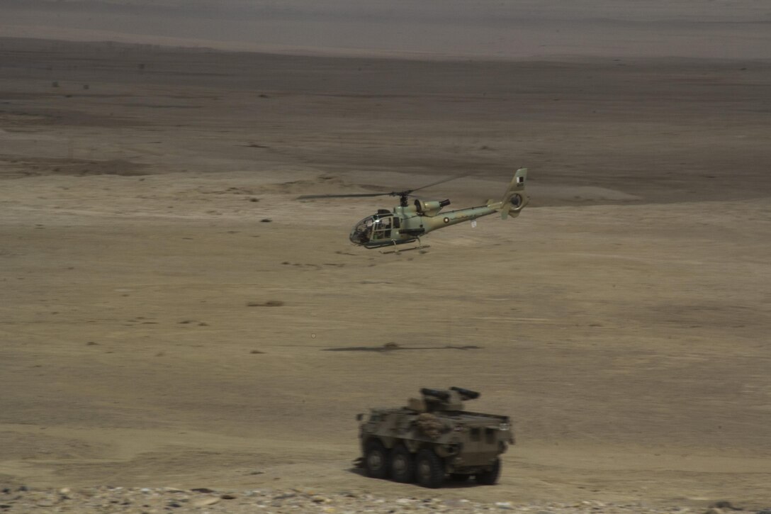 U.S. Marines and Sailors assigned to the 26th Marine Expeditionary Unit (MEU), conduct the final Eagle Resolve exercise with members of the Qatar Emiri Land Forces, in Al Galail, Qatar, May 2, 2013. Eagle Resolve is an annual multilateral exercise designed to enhance regional cooperative defense efforts in the Gulf Cooperation Council nations and U.S. Central Command. The 26th MEU is deployed to the 5th Fleet area of operations as part of the Kearsarge Amphibious Ready Group. The 26th MEU operates continuously across the globe, providing the president and unified combatant commanders with a forward-deployed, sea-based quick reaction force. (U.S. Marine Corps photograph by Gunnery Sgt. Michael Kropiewnicki, 26th MEU Combat Camera/Released)
