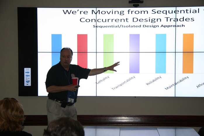 Mike O’Neal, Modeling and Simulation team lead at Marine Corps Systems Command, explains how the Georgia Tech Research Institute facility at Marine Corps Base Quantico, Va., can serve people throughout the command and elsewhere in the Department of Defense. The GTRI facility was designed to support the use of the advanced Model Based Systems Engineering tools for analysis of alternatives. 