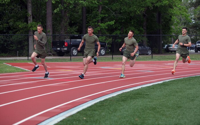 Marines with 2nd Marine Logistics Group race each other during a track and field event at the unit’s field meet aboard Camp Lejeune, N.C., May 1, 2013. Each Marine was representing a different company or battalion and competed to be best in the MLG.