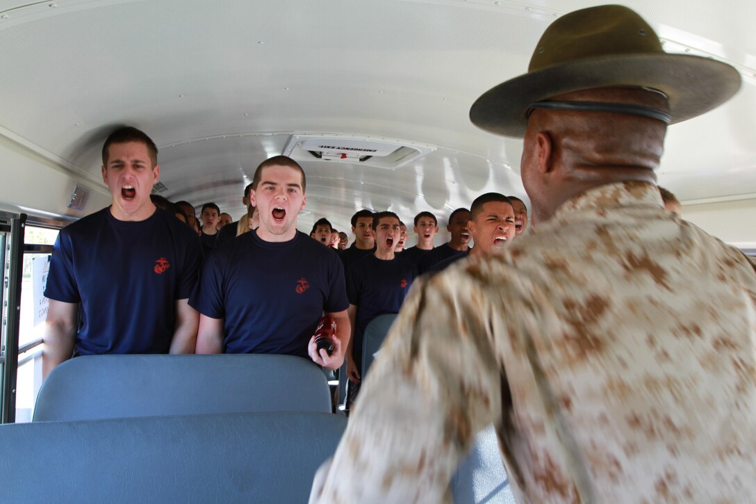 Sgt. Tashan Williams, a drill instructor from Marine Corps Recruit Depot, Parris Island, gives Poolees, men and women who have enlisted in the Marine Corps and are waiting to attend boot camp, a taste of what is to come, during the 2013 Annual Field Meet, at Chicopee High School’s Football Field, May 4, 2013. Approximately 600 newly enlisted men and women from across New England, to include; Western Massachusetts, Connecticut, Vermont and Rhode Island, attended the event. The annual Marine Corps event is designed to test the Poolees’ physical fitness with a pull-up and sit-up competition to ensure that they are prepared for the rigors of Marine Corps boot camp. (Official Marine Corps Photo by Sgt. Richard Blumenstein)