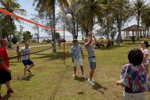 Capt. Carl M. Tutt, center, and other Marines play volleyball with local veterans and community members April 27 at Nimitz Beach, Guam, as part of the 3rd annual “Once a Marine, Always a Marine” barbecue.  The cook-out was organized by local veterans with help from the 3rd Marine Division Association as a way to continue the camaraderie the Marine Corps is known for and show appreciation for the positive impact the Marines have had on Guam.  Tutt is Operations Officer with the Forward Command Element, 3rd Marine Logistics Group, III Marine Expeditionary Force, in Guam to participate in Exercise Guahan Shield.  