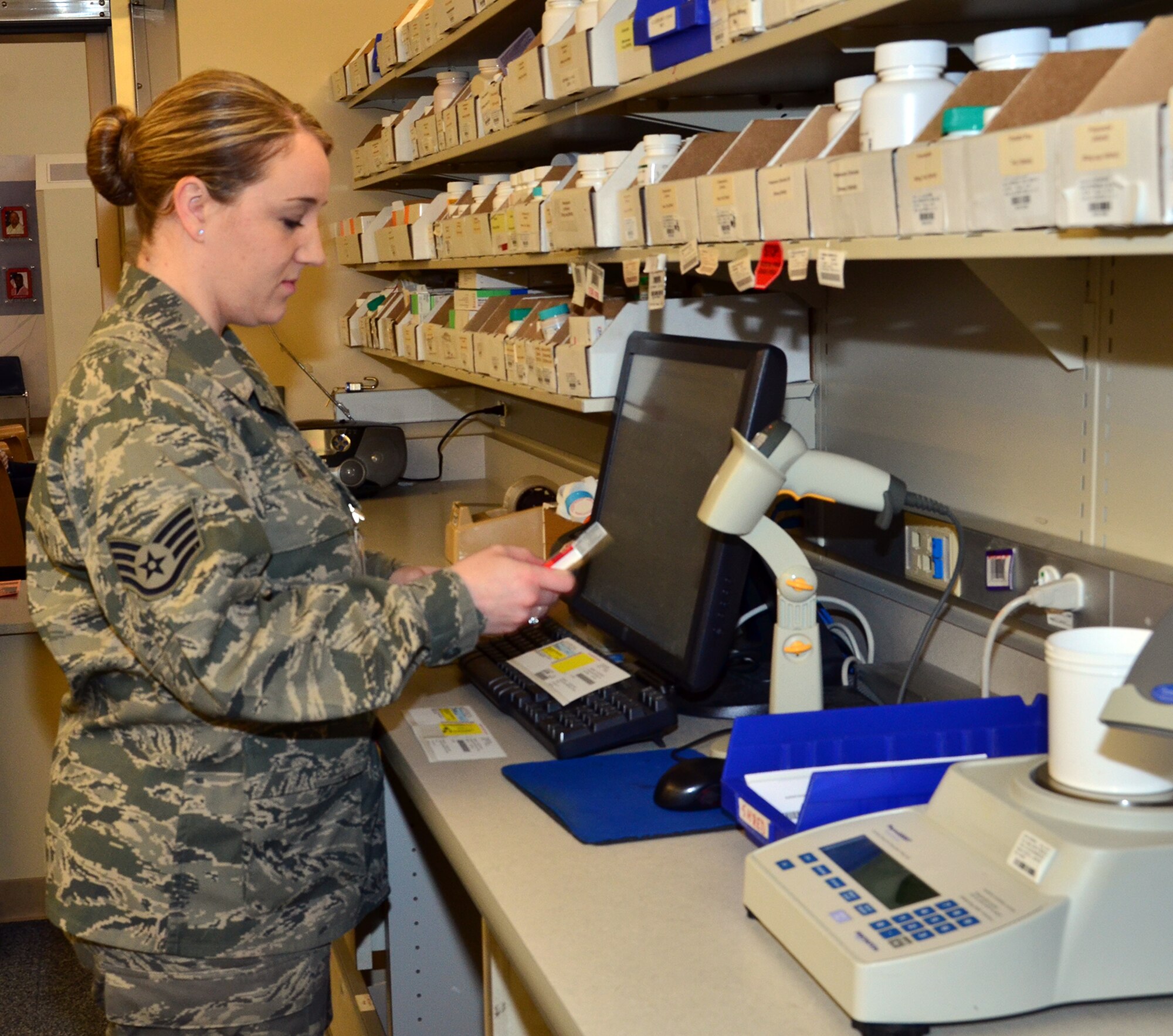 WRIGHT-PATTERSON AIR FORCE BASE, Ohio - Staff Sgt. Nichole Huck, 445th Aeromedical Staging Squadron pharmacy technician, fills prescriptions at the Wright-Patterson Air Force Base Medical Center April 15. Twenty-two ASTS Airmen conducted their annual tour April 6 – 20 at the WPAFB Medical Center where they received training in job classification skills, sustainment and readiness skills in various departments to include the laboratory, pharmacy, nursing, medical administration, surgical technology and radiology. (U.S. Air Force photo/Lt. Col. Cynthia Harris)