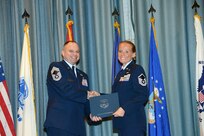 U.S. Air Force personnel at Joint Base San Antonio received their associates, bachelors, and masters degrees May 3, at a ceremony in the Fleenor Auditorium Joint Base San Antonio-Randolph. The Community College of the Air Force provides two year applied science degrees as part Air University's military education system. (U.S. Air Force photo by Benjamin Faske) (released)