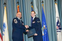 U.S. Air Force personnel at Joint Base San Antonio received their associates, bachelors, and masters degrees May 3, at a ceremony in the Fleenor Auditorium Joint Base San Antonio-Randolph. The Community College of the Air Force provides two year applied science degrees as part Air University's military education system. (U.S. Air Force photo by Benjamin Faske) (released)