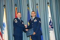 U.S. Air Force personnel at Joint Base San Antonio received their associates, bachelors, and masters degrees May 3, at a ceremony in the Fleenor Auditorium Joint Base San Antonio-Randolph. The Community College of the Air Force provides two year applied science degrees as part Air University's military education system. (U.S. Air Force photo by Benjamin Faske) (released)