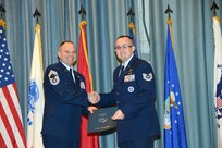 U.S. Air Force personnel at Joint Base San Antonio received their associates, bachelors, and masters degrees May 3, at a ceremony in the Fleenor Auditorium Joint Base San Antonio-Randolph. The Community College of the Air Force provides two year applied science degrees as part Air University's military education system. (U.S. Air Force photo by Benjamin Faske) (released)