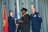 U.S. Air Force personnel at Joint Base San Antonio received their associates, bachelors, and masters degrees May 3, at a ceremony in the Fleenor Auditorium Joint Base San Antonio-Randolph. The Community College of the Air Force provides two year applied science degrees as part Air University's military education system. (U.S. Air Force photo by Benjamin Faske) (released)