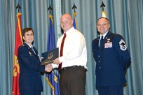 U.S. Air Force personnel at Joint Base San Antonio received their associates, bachelors, and masters degrees May 3, at a ceremony in the Fleenor Auditorium Joint Base San Antonio-Randolph. The Community College of the Air Force provides two year applied science degrees as part Air University's military education system. (U.S. Air Force photo by Benjamin Faske) (released)