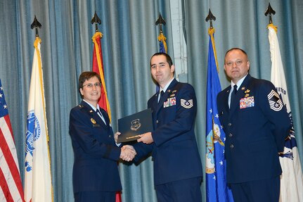 U.S. Air Force personnel at Joint Base San Antonio received their associates, bachelors, and masters degrees May 3, at a ceremony in the Fleenor Auditorium Joint Base San Antonio-Randolph. The Community College of the Air Force provides two year applied science degrees as part Air University's military education system. (U.S. Air Force photo by Benjamin Faske) (released)