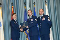 U.S. Air Force personnel at Joint Base San Antonio received their associates, bachelors, and masters degrees May 3, at a ceremony in the Fleenor Auditorium Joint Base San Antonio-Randolph. The Community College of the Air Force provides two year applied science degrees as part Air University's military education system. (U.S. Air Force photo by Benjamin Faske) (released)