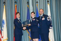 U.S. Air Force personnel at Joint Base San Antonio received their associates, bachelors, and masters degrees May 3, at a ceremony in the Fleenor Auditorium Joint Base San Antonio-Randolph. The Community College of the Air Force provides two year applied science degrees as part Air University's military education system. (U.S. Air Force photo by Benjamin Faske) (released)