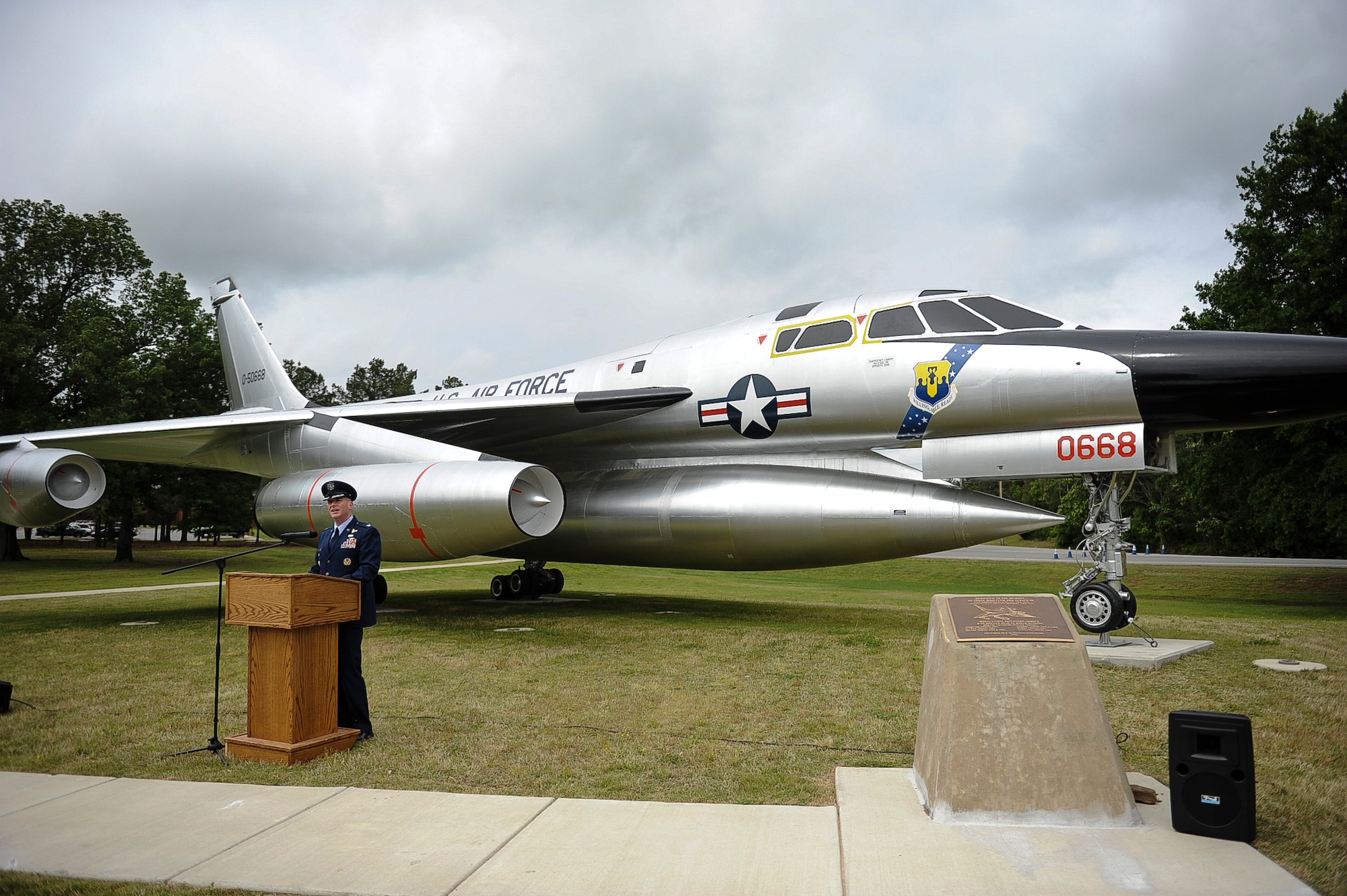 Col. Tom Crimmins, 19th Airlift Wing vice commander, speaks during the dedication ceremony for the B-58 Hustler May 3, 2013, at Little Rock Air Force Base, Ark. The B-58 Hustler was the first operational jet bomber capable of sustaining Mach 2 supersonic flight. (U.S. Air Force photo by Airman 1st Class Cliffton Dolezal)
