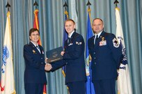 U.S. Air Force personnel at Joint Base San Antonio received their associates, bachelors, and masters degrees May 3, at a ceremony in the Fleenor Auditorium Joint Base San Antonio-Randolph. The Community College of the Air Force provides two year applied science degrees as part Air University's military education system. (U.S. Air Force photo by Benjamin Faske) (released)
