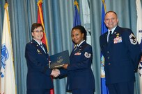 U.S. Air Force personnel at Joint Base San Antonio received their associates, bachelors, and masters degrees May 3, at a ceremony in the Fleenor Auditorium Joint Base San Antonio-Randolph. The Community College of the Air Force provides two year applied science degrees as part Air University's military education system. (U.S. Air Force photo by Benjamin Faske) (released)