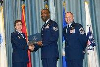 U.S. Air Force personnel at Joint Base San Antonio received their associates, bachelors, and masters degrees May 3, at a ceremony in the Fleenor Auditorium Joint Base San Antonio-Randolph. The Community College of the Air Force provides two year applied science degrees as part Air University's military education system. (U.S. Air Force photo by Benjamin Faske) (released)