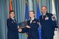 U.S. Air Force personnel at Joint Base San Antonio received their associates, bachelors, and masters degrees May 3, at a ceremony in the Fleenor Auditorium Joint Base San Antonio-Randolph. The Community College of the Air Force provides two year applied science degrees as part Air University's military education system. (U.S. Air Force photo by Benjamin Faske) (released)